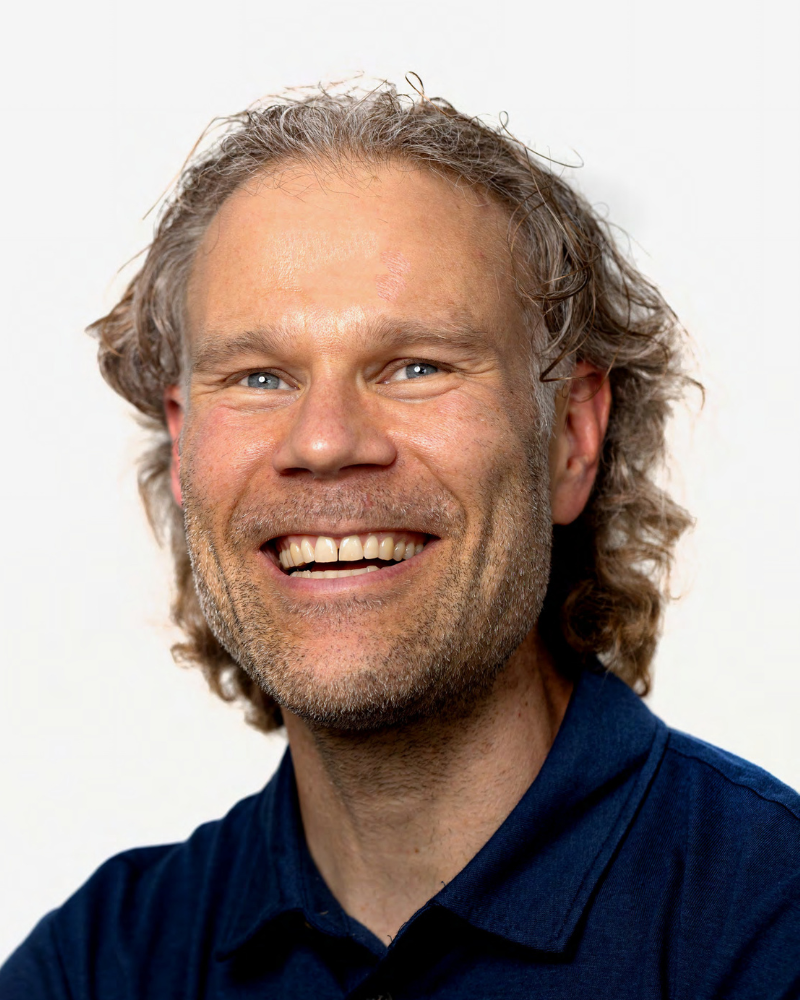 headshot of Charlie A. Damschen