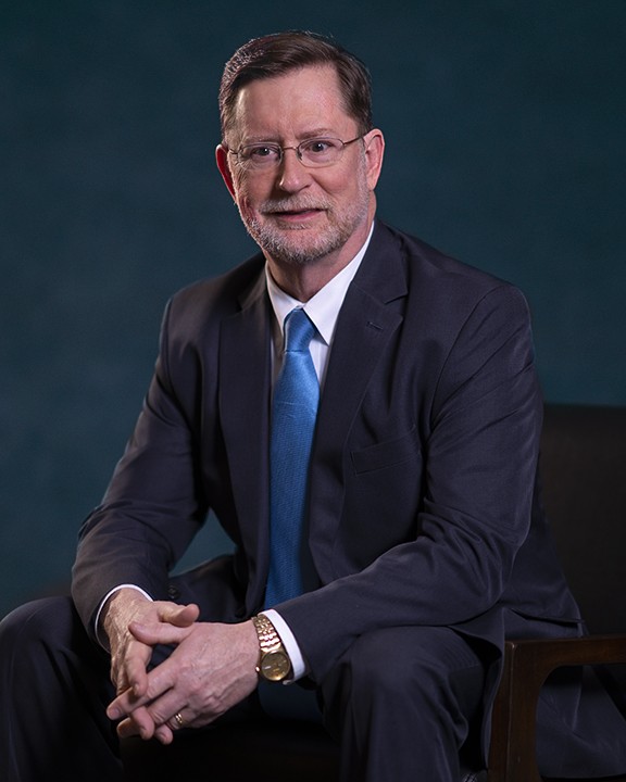 profile headshot of Paul E. Carey